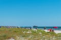 Corbu, Constanta, Romania - August 18, 2019: People enjoy a relaxing summer day on the last virging beach in Corbu, Romania