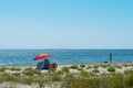 Corbu, Constanta, Romania - August 18, 2019: People enjoy a relaxing summer day on the remote last virging beach in Corbu, Romania