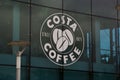 Corby, U.K, april 28, 2019 - Costa sign, logo on window display coffee shop