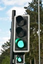 Corby, U.K., june 20, 2019 - Green color on the traffic light, pedestrian crossing