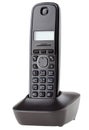 Cordless black telephone with cradle Royalty Free Stock Photo