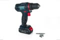 Cordless drill and a set of different bits for drills Royalty Free Stock Photo