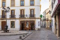 Cordoba, Andalusia, Spain - November 3, 2021: An old pharmacy with beautiful wooden windows in the street of the old Royalty Free Stock Photo