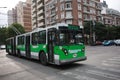 Public electrical transport in Argentina - green articulated pivoting trolleybus on the streets of Cordoba Royalty Free Stock Photo