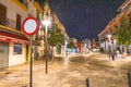 Cordoba, Spain - April 11, 2023: Tourists along the city streets at night Royalty Free Stock Photo