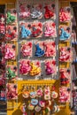 Cordoba, Spain - January 9, 2020: Spanish colorful dresses for dolls on sale, Andalusia. Vertical