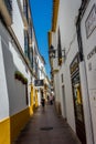 Cordoba, Spain - June 20 : A lone person walking on the streets