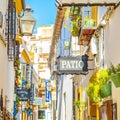 Spanish narrow sunny street in Cordoba