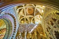 The ribbed dome and polylobed multifoil arches of Villaviciosa Chapel, Mezquita, on Sep 30 in Cordoba, Spain