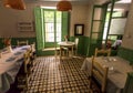 Retro style interior of restaurant with funny decor, vintage details and tables for visitors
