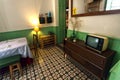 Room in retro style cafe or restaurant with funny decor, tv, vintage details and service