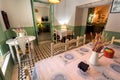 Rooms inside retro style restaurant with funny decor, vintage details and service for visitors