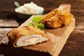 Cordon bleu chicken on cutting board Royalty Free Stock Photo