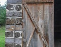 Cordwood and log beams with an old wooden door at Old World Wisconsin Royalty Free Stock Photo