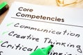 Core Competencies list on a table.