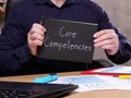Core Competencies is shown on the business photo using the text