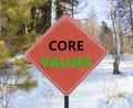 Core values symbol. Concept words Core values on beautiful red road sign. Beautiful forest snow blue sky background. Business Royalty Free Stock Photo