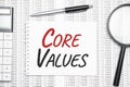Core Values text on paper with calculator,magnifier ,pen on the graph background Royalty Free Stock Photo