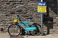 Corfe, England - June 03 2018:Decorated blue bicycle belonging to Boilerhouse Gallery, advertising Purbeck Art Week or PAW Royalty Free Stock Photo