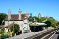 Corfe railway station and castle. Royalty Free Stock Photo