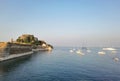 Corflu island castle, liight and church of st george by the sea , greece Royalty Free Stock Photo