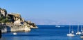 Corflu island castle, liight and church of st george by the sea , greece Royalty Free Stock Photo