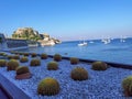 Corflu island castle, liight and church of st george by the sea , greece Royalty Free Stock Photo