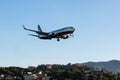 CORFU, GREECE - APRIL 3, 2018: Modern passenger airplane of Ryanair airlines before landing in airport of Corfu island, Greece Royalty Free Stock Photo