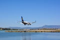 CORFU, GREECE - APRIL 8, 2018: Modern passenger airplane of Ryanair airlines before landing at Corfu island airport, Greece Royalty Free Stock Photo