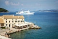 CORFU, GREECE - 10.09.2019 - Faliraki beach Alecos Baths public bathing spot with rock and pier ans restaurant in Corfu