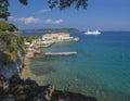 Corfu, Greece - June 7, 2017: Faliraki beach Alecos Baths public bathing spot with the En plo restaurant in Corfu Town, turquoise