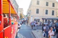 Corfu, Greece - 16.10.2018: Tourist bus in street of Kerkira, the capital of Corfu, Greece