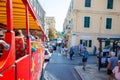 Corfu, Greece - 16.10.2018: Tourist bus in street of Kerkira, the capital of Corfu, Greece