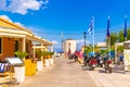 Corfu island esplanade restaurants and Anemomilos windmill Greece