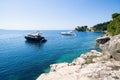 Corfu island, Greece, beautiful bay with a boat. Picturesque greek seascape. Yachting and travel concept