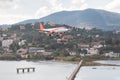 Corfu island, Greece. Modern passenger airplane landing at international airport. Royalty Free Stock Photo