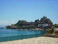 Corfu Island, Greece. Small boats port and old Kerkyra fortress in background Royalty Free Stock Photo