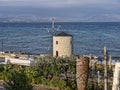 Early Morning Windmill by the Bay of Corfu Town on the Greek Island of Corfu