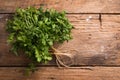 Coriander leaves, fresh green cilantro on wooden background . Royalty Free Stock Photo