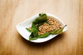 Coriander on a wood table