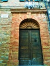 Corinaldo town in the province of Ancona, Marche region, Italy. History, time, ancient door and fascination