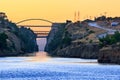 The Corinth Canal transport corridor between two seas in Greece in the early morning haze