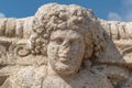 Corinthian capital bearing the carved head of Dionysus at Beit She`an in Israel Royalty Free Stock Photo
