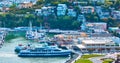 Corinthian Yacht Club aerial of ships docked at pier with expensive houses on shoreline cliff