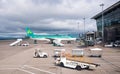 Cork airport terminal with air lingus airplane on the departure runway