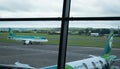 Cork airport terminal with air lingus airplane on the departure runway