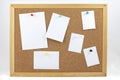 Cork board with blank paper notes Royalty Free Stock Photo