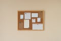 cork board with blank papers wooden frame. notes. colourful pin and paperclips . reminder. pin board. isolated. new year\'s Royalty Free Stock Photo