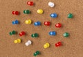 Cork board with lot a colorful pins. Royalty Free Stock Photo