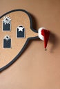 Cork board for notes Christmas and New Year preparations. santa hat symbol of the holiday